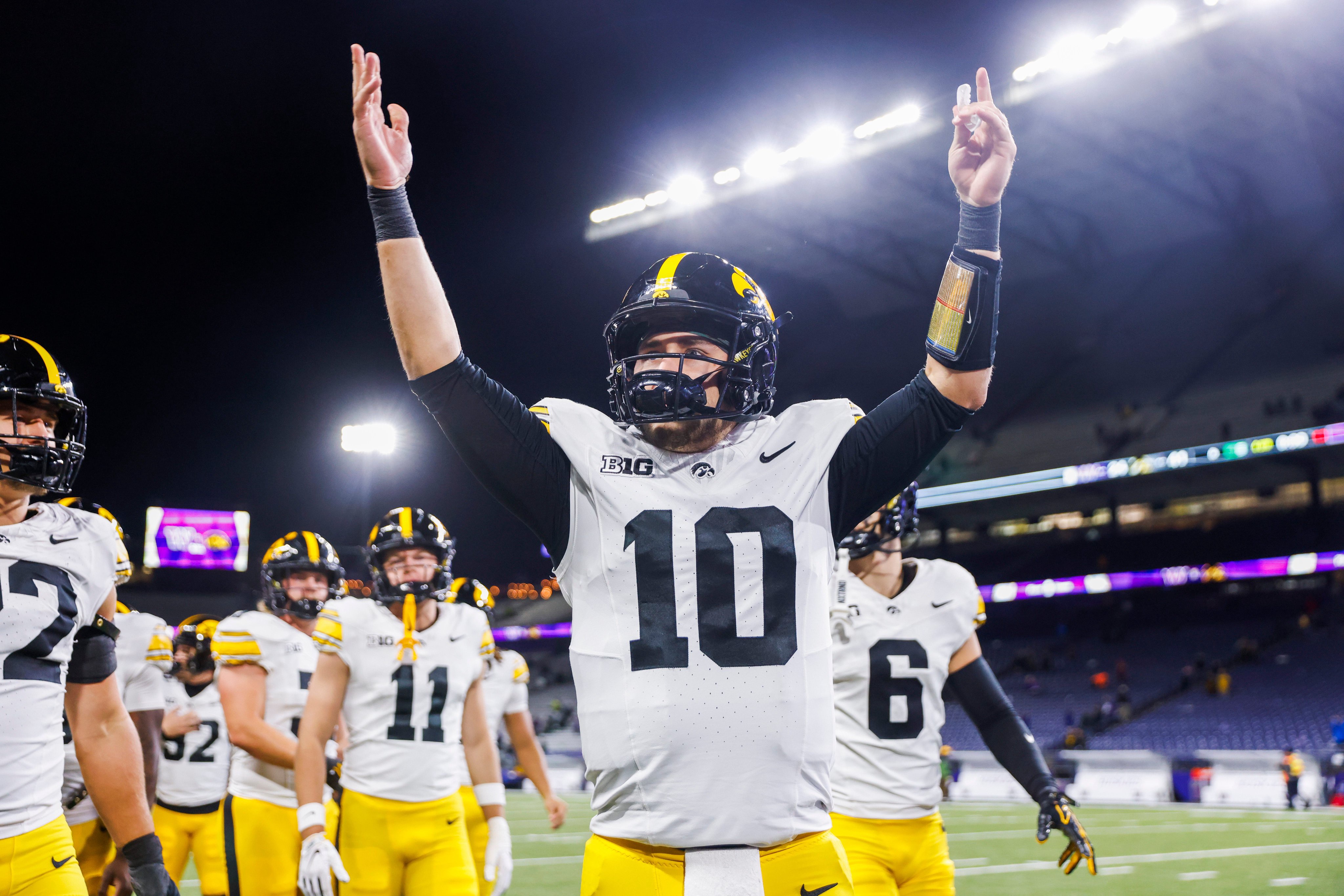 Oct 9, 2026; Seattle, Washington, USA; Iowa Hawkeyes quarterback Jeremy Hecklinski (10) celebrates following a victory against the Washington Huskies at Husky Stadium. Mandatory Credit: Joe Nicholson-Imagn Images