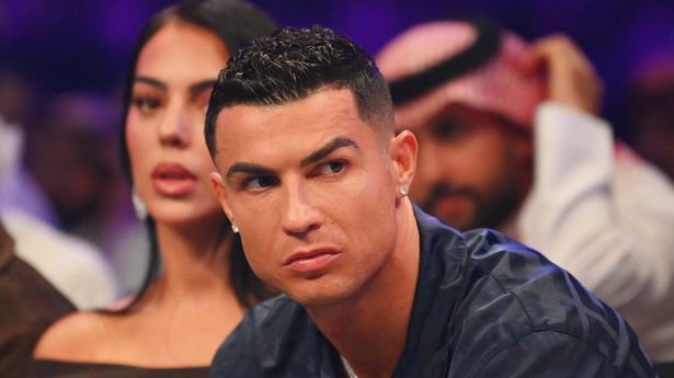 Cristiano Ronaldo looks on from ringside prior to the Heavyweight fight between Tyson Fury and Francis Ngannou at Boulevard Hall