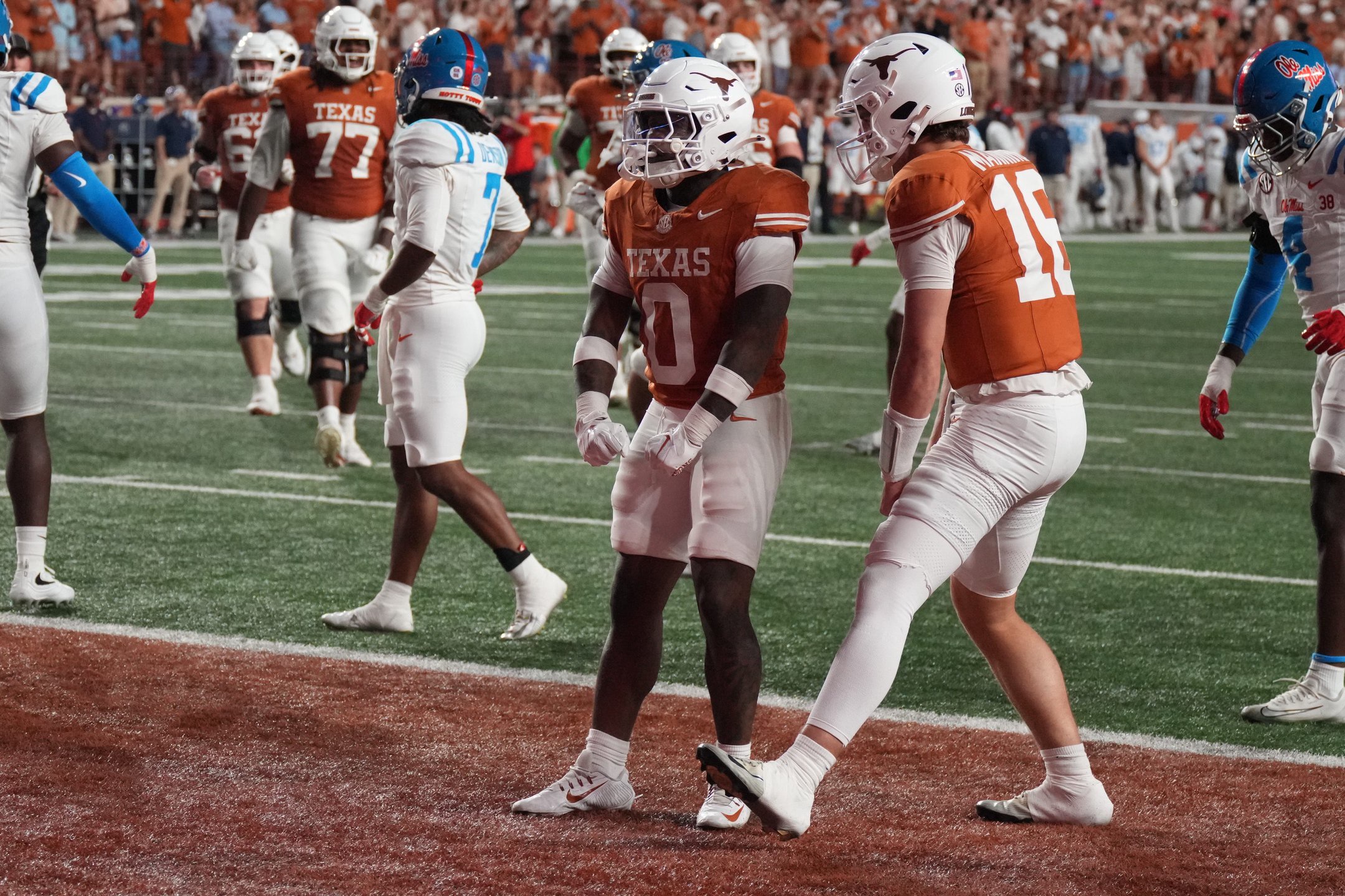Oct 24, 2026; Austin, Texas, USA;  Texas Longhorns running back Raleek Brown (0) reacts after a run with quarterback Arch Manning (16) during the first half against the Mississippi Rebels at Darrell K Royal-Texas Memorial Stadium.  Mandatory Credit: Scott Wachter-Imagn Images