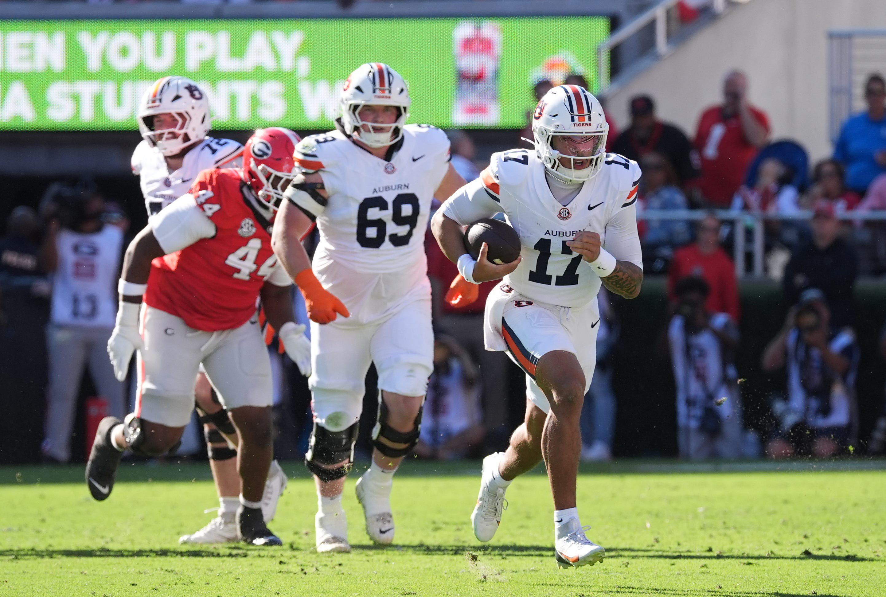 Oct 17, 2026; Athens, Georgia, USA;  Auburn quarterback Byrum Brown (17) runs for a gain during the first quarter against Georgia at Sanford Stadium.  Mandatory Credit: Dale Zanine-Imagn Images