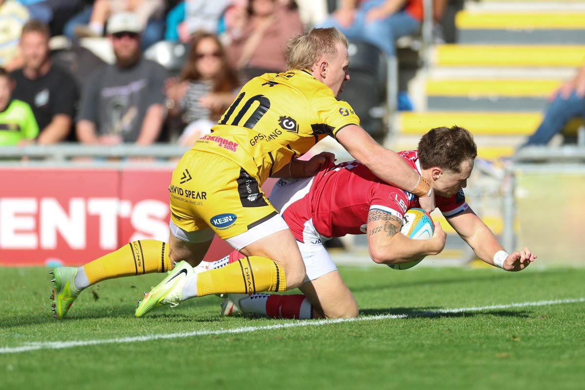Macs Page of Scarlets races in to score