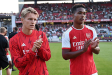 Martin Odegaard and Reuell Walters applaud the Arsenal fans (Photo via Arsenal.com)