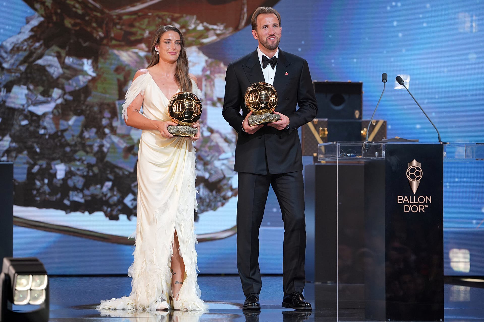 English footballer Harry Kane and Spaniard Alexia Putellas receive the player of the year awards at the Ballon d'Or ceremony.