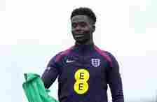 Bukayo Saka of England looks on during a training session at Spa & Golf Resort Weimarer Land on June 28, 2024 in Blankenhain, Germany.