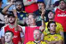 Arsenal fans in the stands react during the second half during the Premier League match at Vicarage Road, Watford. PA Photo