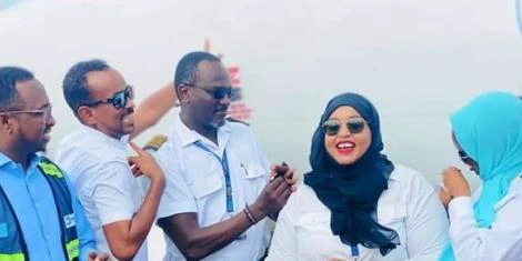 Captain Yasmin Abdi Farah (center) celebrates after becoming the first female pilot to fly the Somali skies. Her maiden flight was from Mogadishu to Kismaiyo