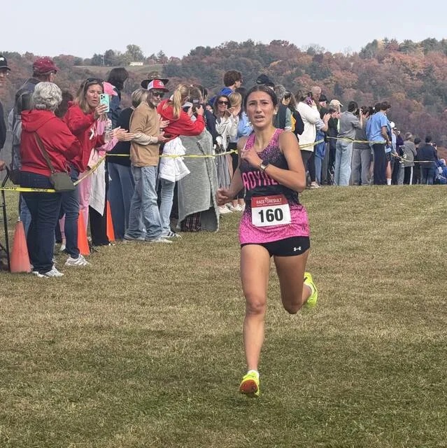 <p>Holy Redeemer’s Gianna Altavilla approaches the finish line for her win in the Class A race at Wednesday’s District 2 Cross Country Championships.</p>
                                 <p>Tom Robinson | For Times Leader</p>