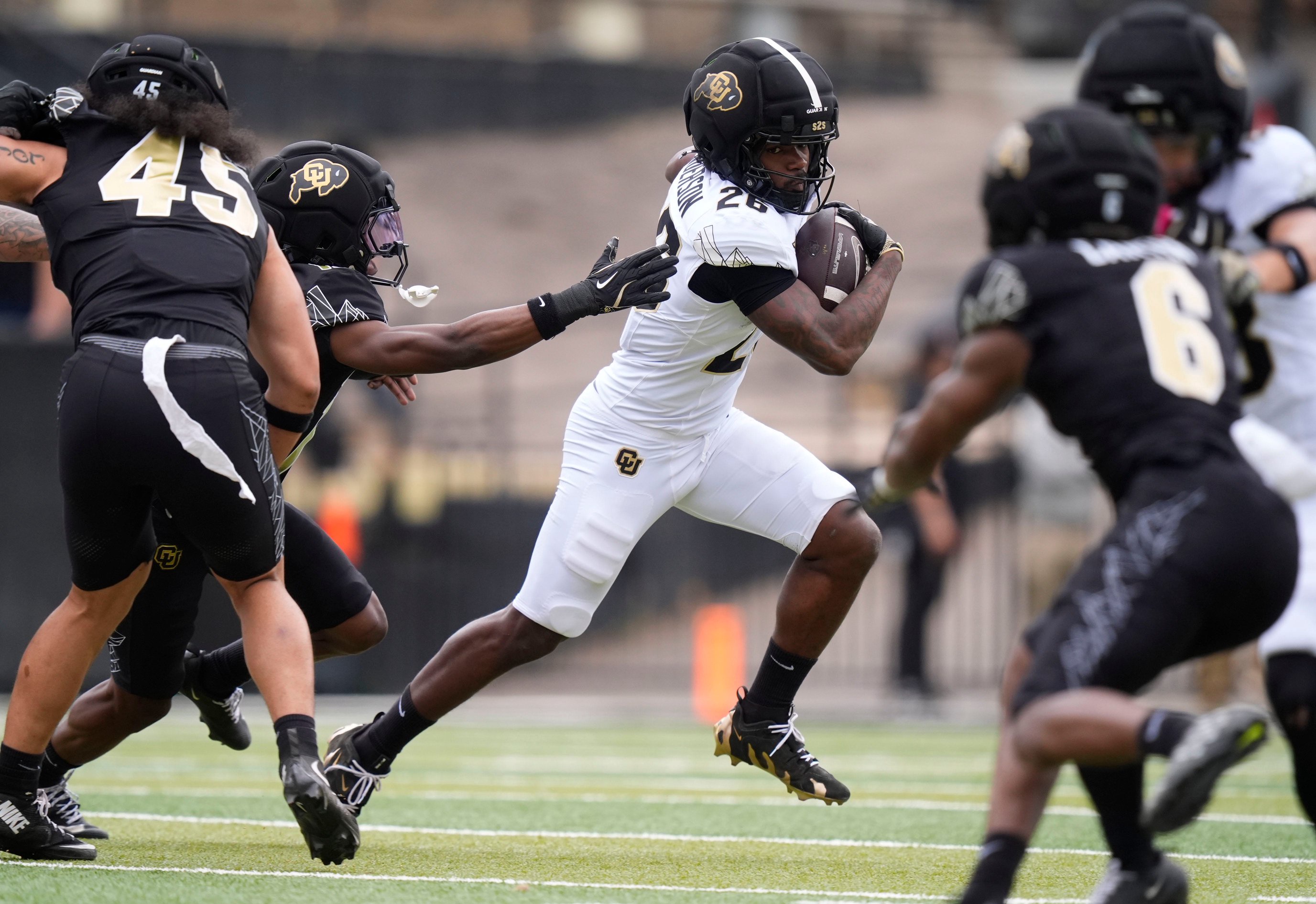 Apr 11, 2026; Boulder, CO, USA; Colorado Buffaloes running back Damian Henderson (26) carries the ball during the spring game at Folsom Field. Mandatory Credit: Ron Chenoy-Imagn Images