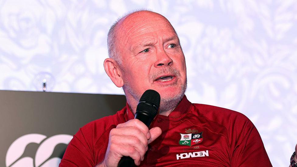 Lions chair Ieuan Evans speaks into a microphone