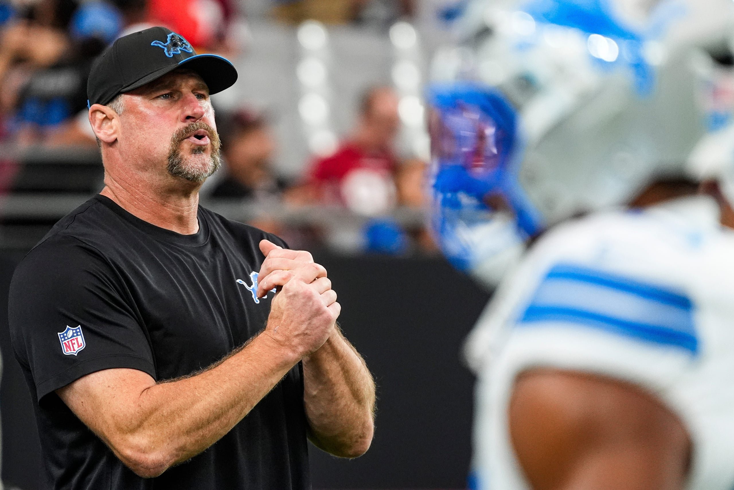 Detroit Lions head coach Dan Campbell looks on after warmup ahead of the game between Arizona Cardinals and Detroit Lions at