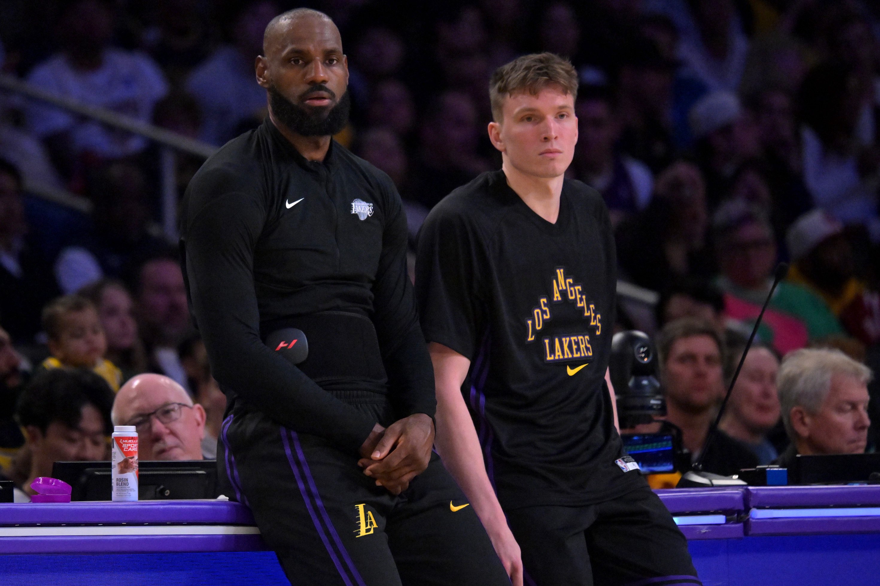 Jan 2, 2026; Los Angeles, California, USA; Los Angeles Lakers forward LeBron James (23) and forward Dalton Knecht (4) wait to enter the game during the first half against the Memphis Grizzlies at Crypto.com Arena. Mandatory Credit: Jayne Kamin-Oncea-Imagn Images