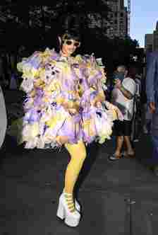 new york, new york july 01 cardi b is seen wearing a marc jacobs sheer ruffled outfit, yellow leggings and white marc jacobs shoes outside the marc jacobs show on july 01, 2024 in new york city photo by daniel zuchnikgetty images