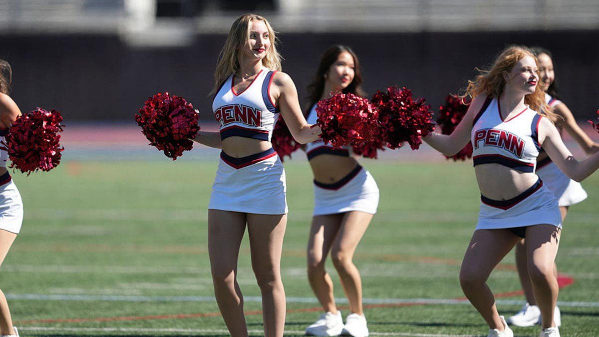 Penn Quakers dancers perform during a game at Franklin Field.