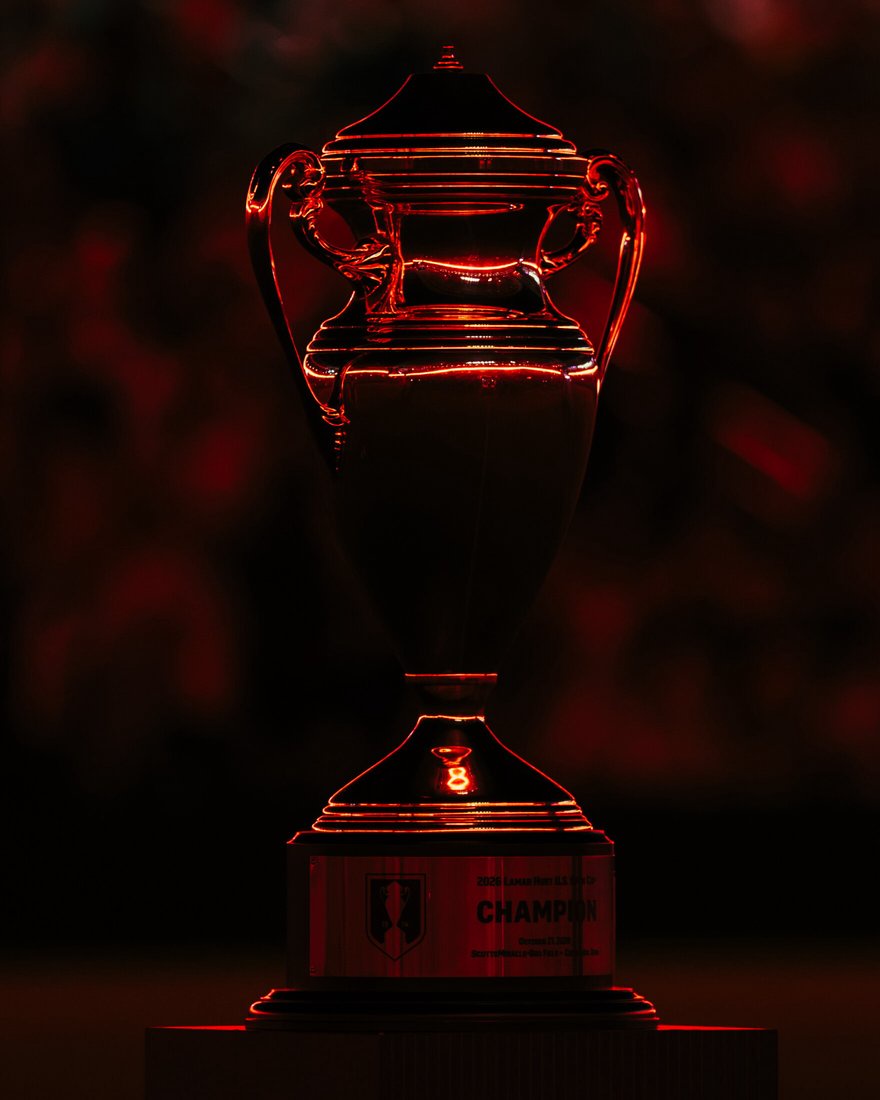 The Lamar Hunt U.S. Open Cup trophy glows under red lights during a pregame celebration of St. Louis City SC’s first trophy on Wednesday, Oct. 28, 2026, at Energizer Park in St. Louis’ Downtown West neighborhood.