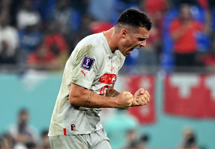 Arsenal star Granit Xhaka pose with Man of match award after stunning display for Switzerland against Serbia 