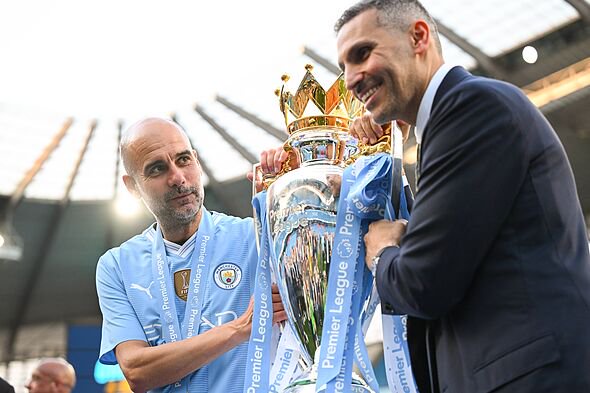 Pep Guardiola and Khaldoon Al Mubarak both posing
