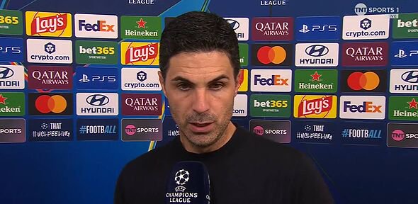 Mikel Arteta speaks into a microphone
