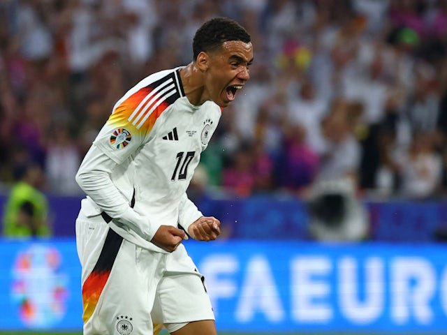 Jamal Musiala celebrates scoring for Germany on June 14, 2024