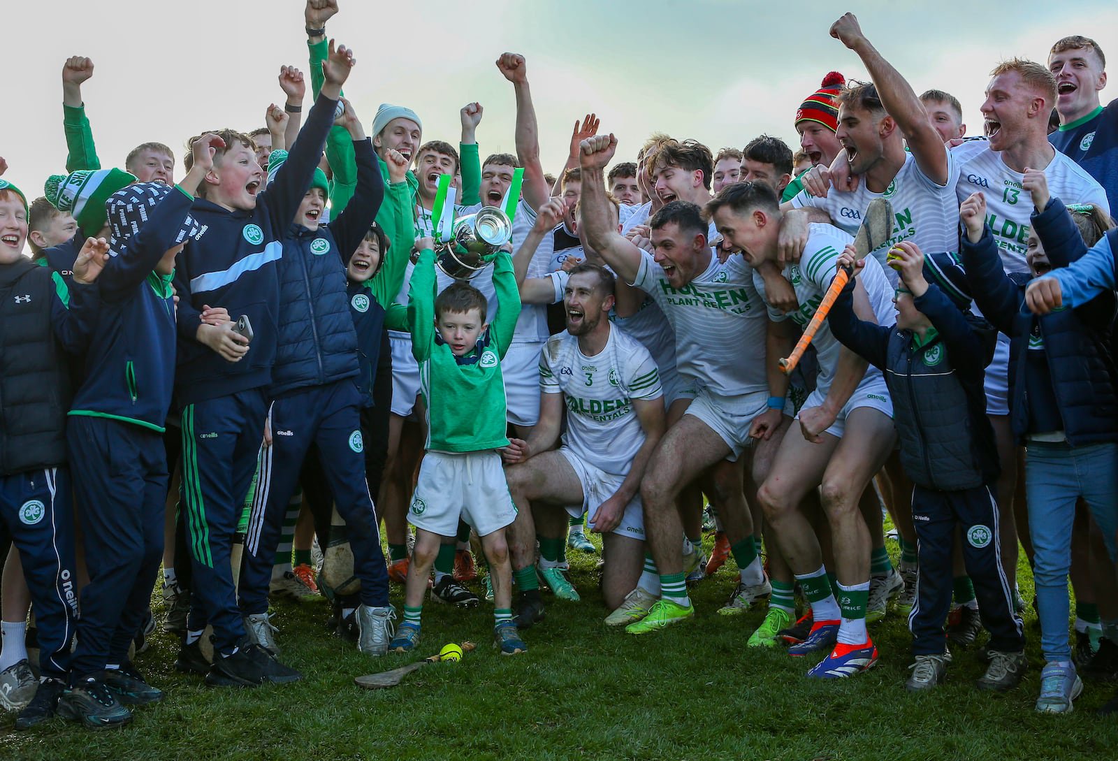 Ballyhale Shamrocks celebrate with Cillian Shefflin as he raises the cup after they win the Kilkenny title for the 22nd time (©INPHO/Ken Sutton)