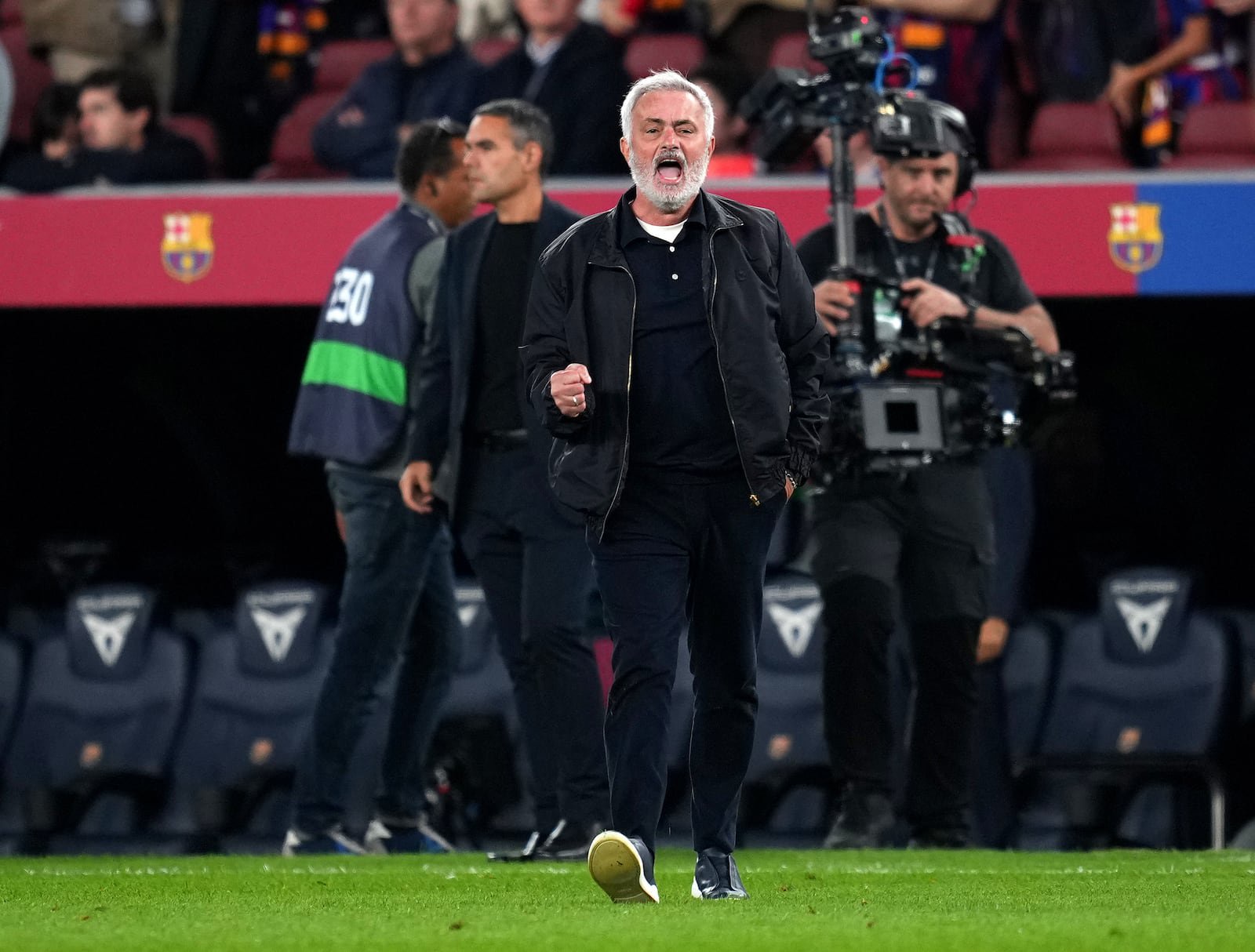 Real Madrid head coach José Mourinho celebrates his team's 2-1 victory against Barcelona in Sunday's La Liga match at Camp Nou, Barcelona. Photograph: Alex Caparros/Getty Images