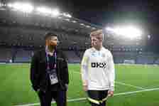 Former Manchester City player Sergio Aguero talks to Kevin De Bruyne of Manchester City during the Manchester City Training Session ahead of the UE...