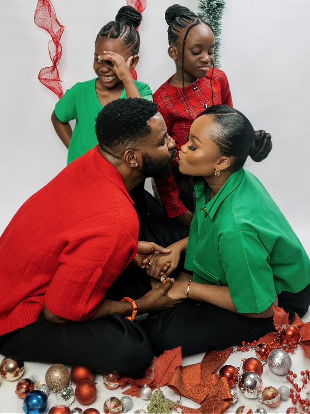TV host Ebuka Obi-Uchendu shares a festive Christmas moment with his wife and children during a family photoshoot