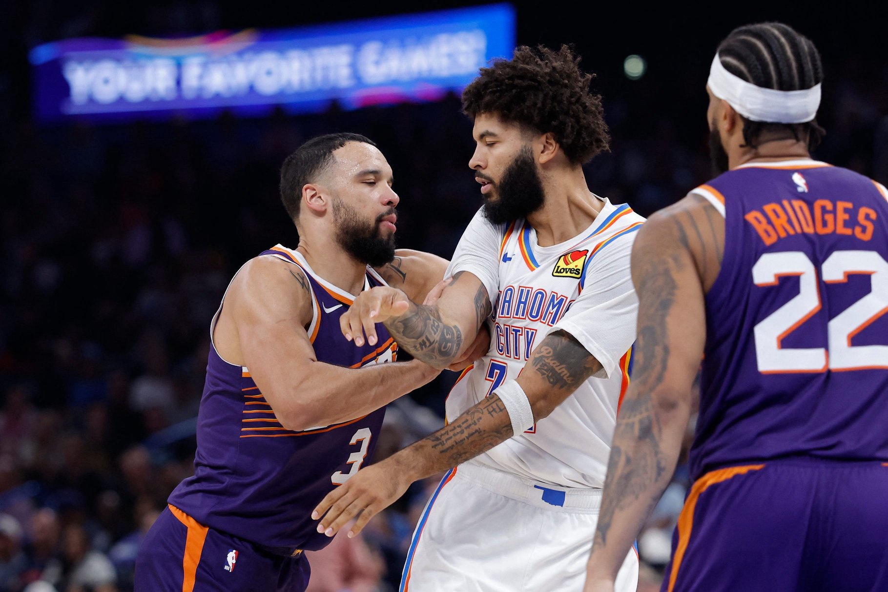 Oct 26, 2026; Oklahoma City, Oklahoma, USA; Phoenix Suns forward Dillon Brooks (3) pushes Oklahoma City Thunder guard Kenrich Williams (34) after a play during the second half at Paycom Center. Mandatory Credit: Alonzo Adams-Imagn Images