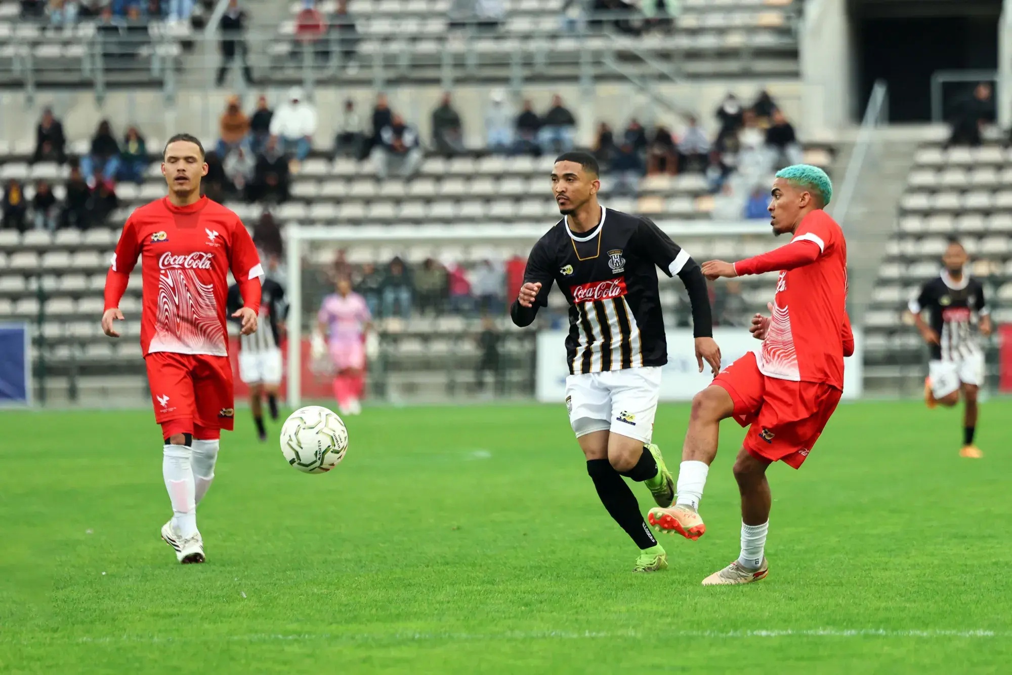 Hanover Park’s Imtiyaaz Ruiters clears the ball during Saturday’s Coke Cup final at Athlone Stadium.