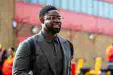 Micah Richards arrives prior to the Premier League match between Manchester United and Manchester City at Old Trafford on October 29, 2023 in Manch...