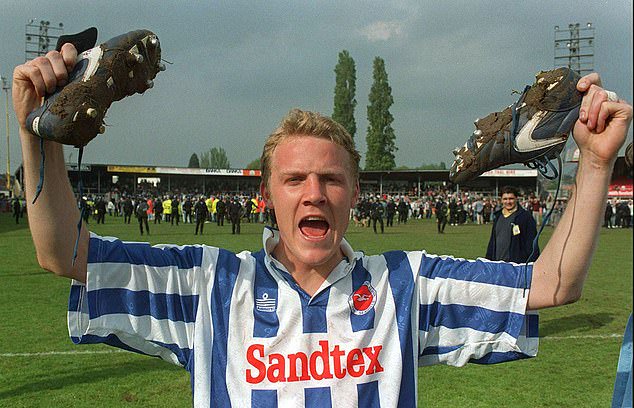 Robbie Reinelt celebrates at the end of the match after scoring Brighton's crucial goal against Hereford that kept them from being relegarted from the Football League