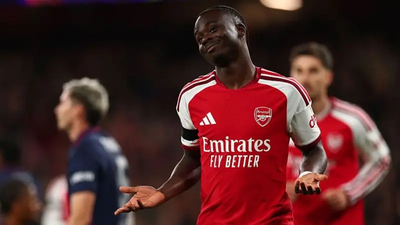 Bukayo Saka celebrates scoring for Arsenal against Lille