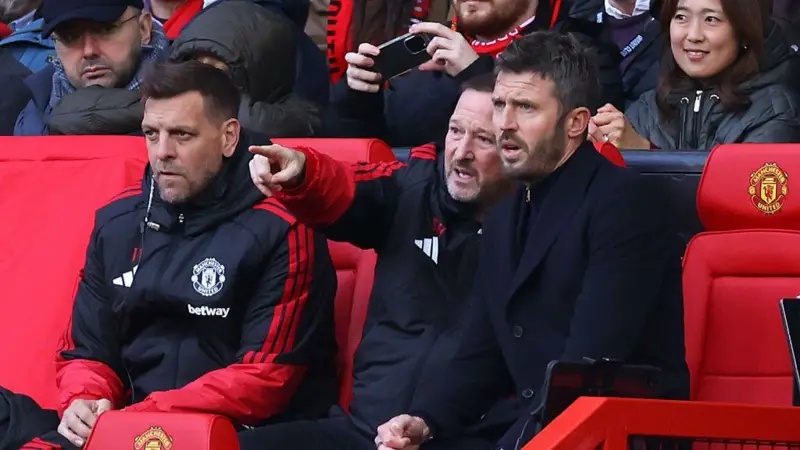 Michael Carrick and his staff watch Manchester United's defeat to Bournemouth