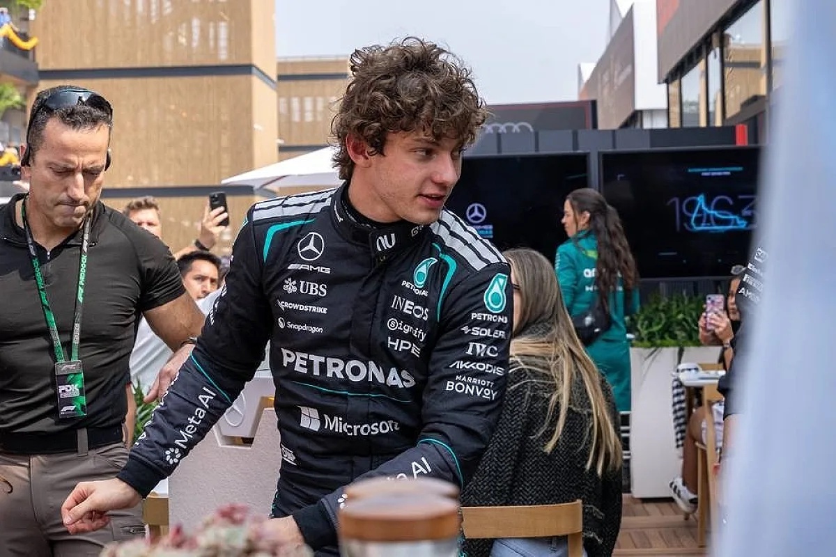 Driver in a black Mercedes-AMG Petronas F1 race suit with Mercedes branding in the paddock, Kimi Antonelli in Mexico City