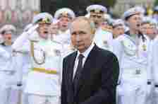 Russian President Vladimir Putin looks to Naval officers during the Navy Day Parade, on July, 31 2022, in Saint Petersburg, Russia.