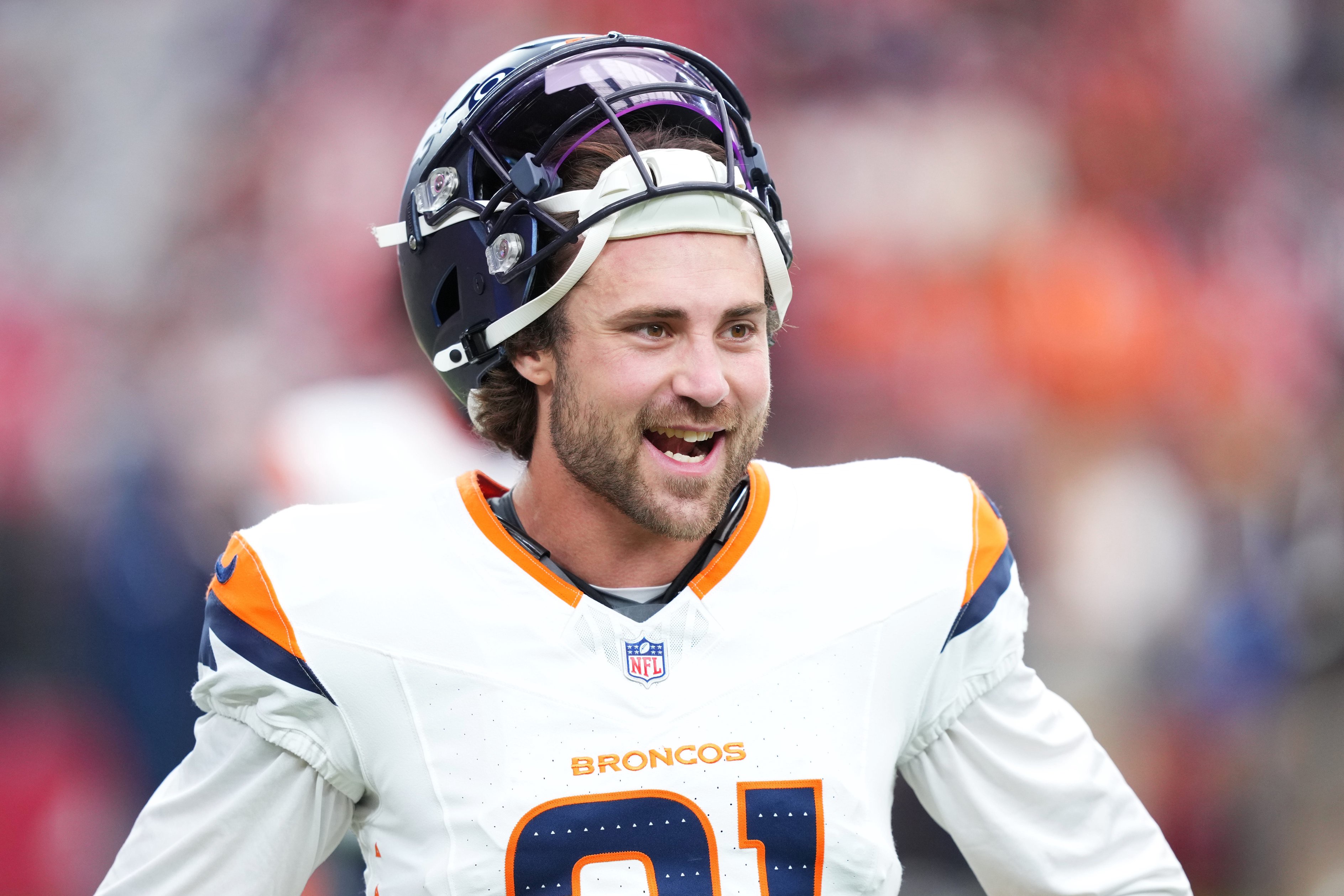 Oct 25, 2026; Glendale, Arizona, USA;  Denver Broncos cornerback Riley Moss (21) looks on before the game against the Arizona Cardinals at State Farm Stadium.  Mandatory Credit: Joe Camporeale-Imagn Images