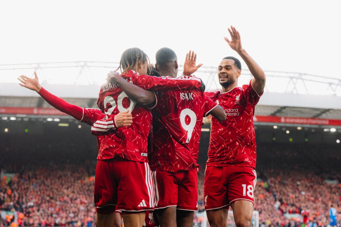 Alexander Isak, Cody Gakpo and Bradley Barcola celebrate after Isak's goal for Liverpool in their Premier League match against Brighton and Hove Albion at Anfield.