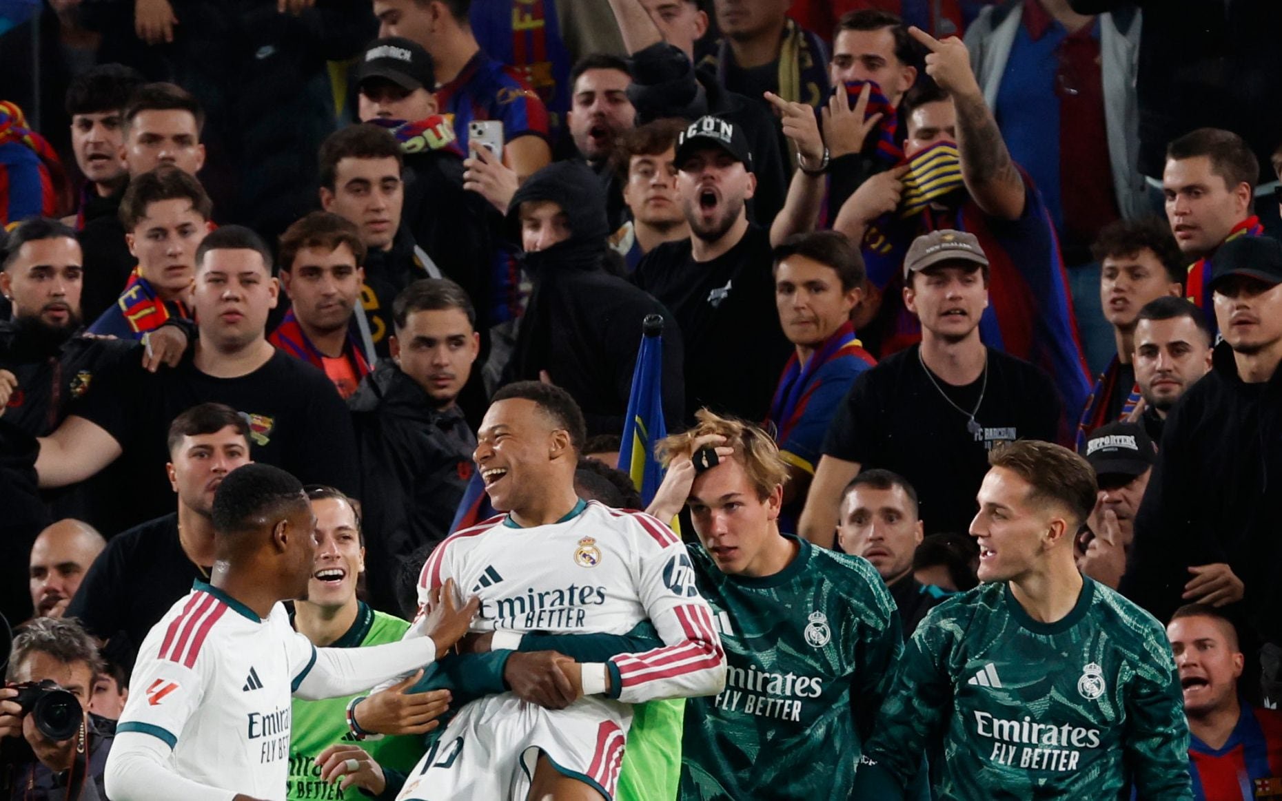 Metres from the Barcelona fans, Mbappe celebrates scoring the winning goal