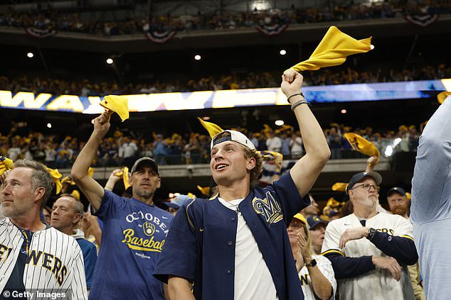 Milwaukee Brewers fans wave towels prior to Game 2 on Saturday night in Wisconsin