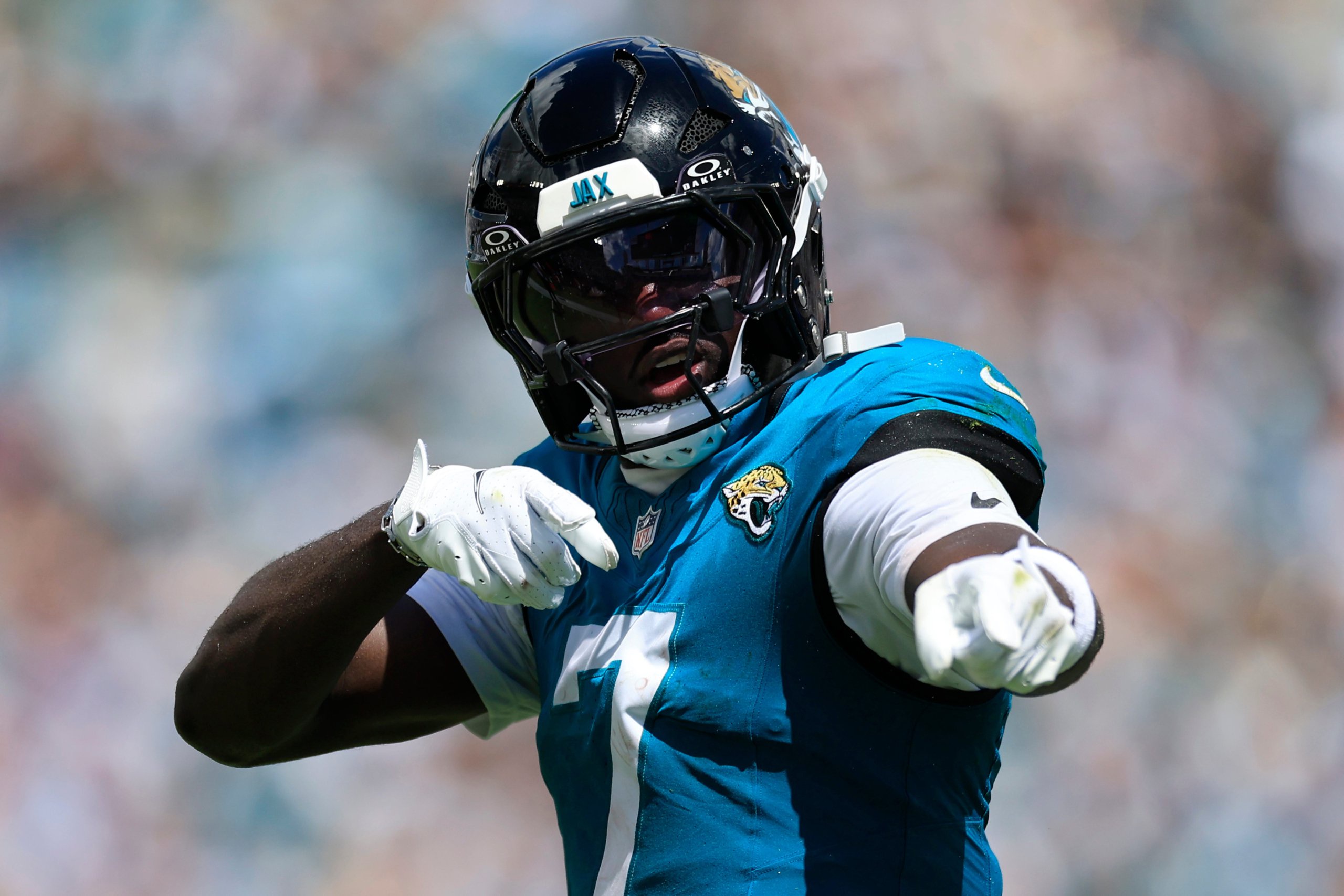 Jacksonville Jaguars wide receiver Brian Thomas Jr. (7) signals a first down after a reception during the first quarter of an