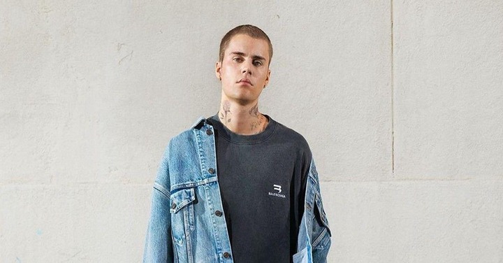 Justin Bieber looking serious against a wall in an image from his Instagram account