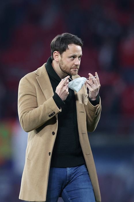 RB Leipzig technical director Christopher Vivell enters the pitch prior to the German first division Bundesliga football match between RB Leipzig and FC Cologne