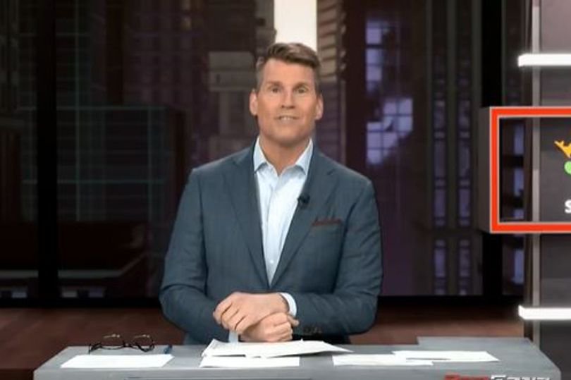Scott Hanson's sits at the Redzone desk