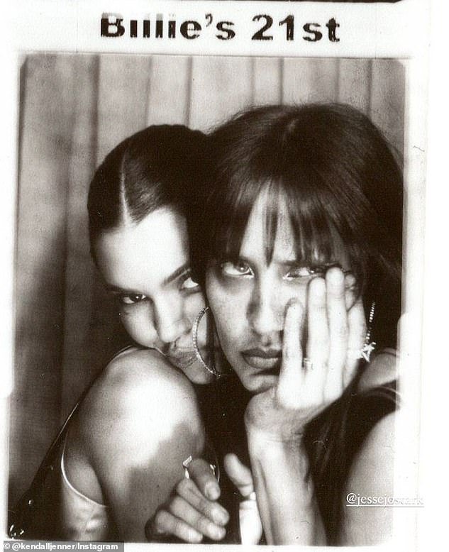 Not just a third wheel: Kendall and Bieber's close friend Jesse Jo Stark, 31, joined them in the photo booth