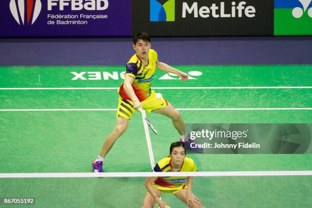 Meng kian tan and jing pei lai of malaysia during the yonex badminton french open at stade