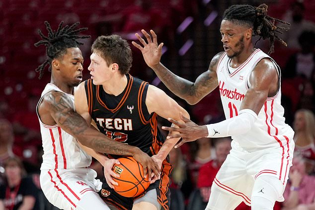 Montana Tech guard Asher Williams, second from left, looks to pass as Houston guard Corey Hadnot, left, and forward Joseph Tugler defend during the first half of an NCAA college basketball exhibition game Thursday, Oct. 15, 2026, in Houston. (AP Photo/Eric Christian Smith)