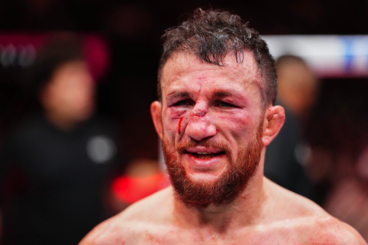 Merab Dvalishvili reacts after his loss to Petr Yan in their fight at UFC 323