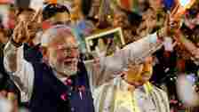 Indian Prime Minister Narendra Modi gestures as he arrives at Bharatiya Janata Party (BJP) headquarters in New Delhi, India