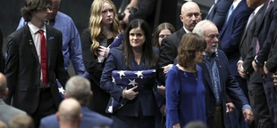 Fallen US Marshal is memorialized by Attorney General Garland, family and others