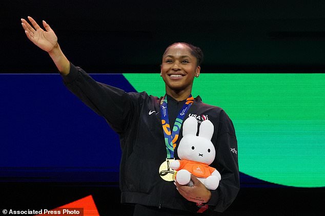 Skye Blakely, of the United States, stands on the podium after winning the gold medal in the women's all-around final at the Artistic Gymnastics World Championships in Rotterdam, the Netherlands, Friday, Oct. 23, 2026. (AP Photo/Patrick Post)
