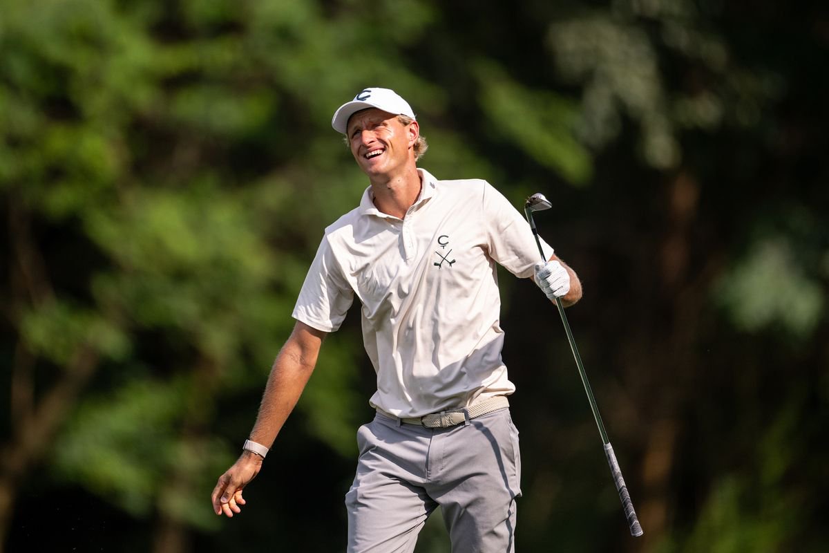 Adrian Meronk looks on after hitting his approach